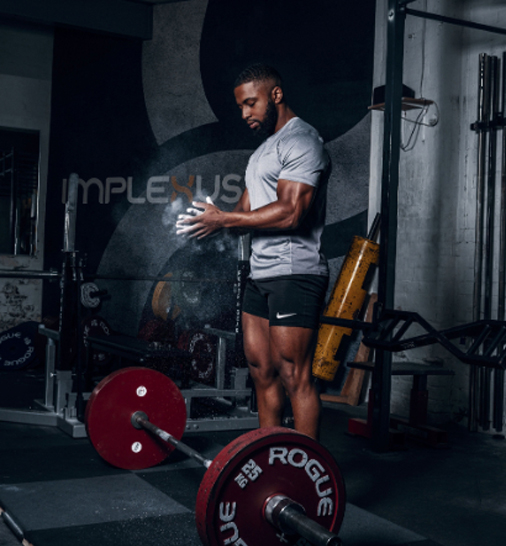 Coach getting ready to lift weights